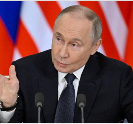 https://theeconomicinfluence.com/Russian President Vladimir Putin during a formal government announcement in May 2025