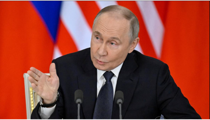 https://theeconomicinfluence.com/Russian President Vladimir Putin during a formal government announcement in May 2025