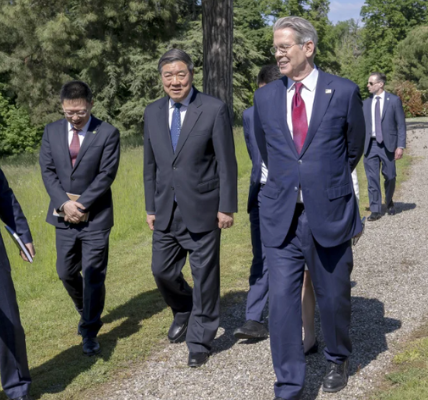 US and Chinese officials in Geneva discussing trade relations during a tense diplomatic exchange amid semiconductor disputes.