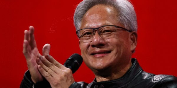 Nvidia CEO Jensen Huang speaking at a tech expo in Beijing, highlighting China’s AI development and H20 chip exports