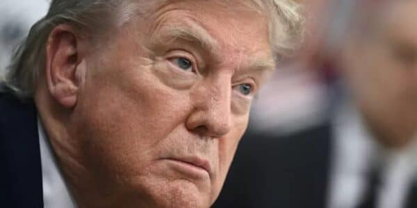 Federal employees at work, representing civil service protections under threat from Schedule Policy/Career rule