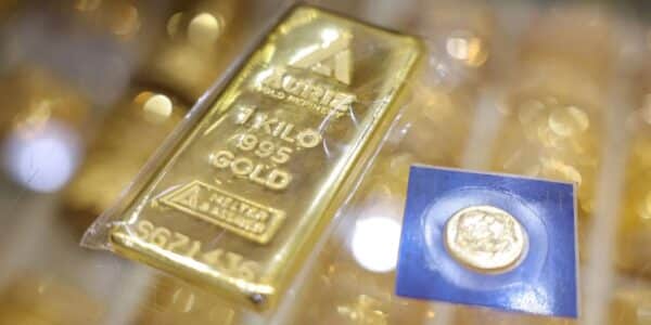 Gold and silver bars displayed at a jewelry store, showing rebound in precious metals prices, 2026.